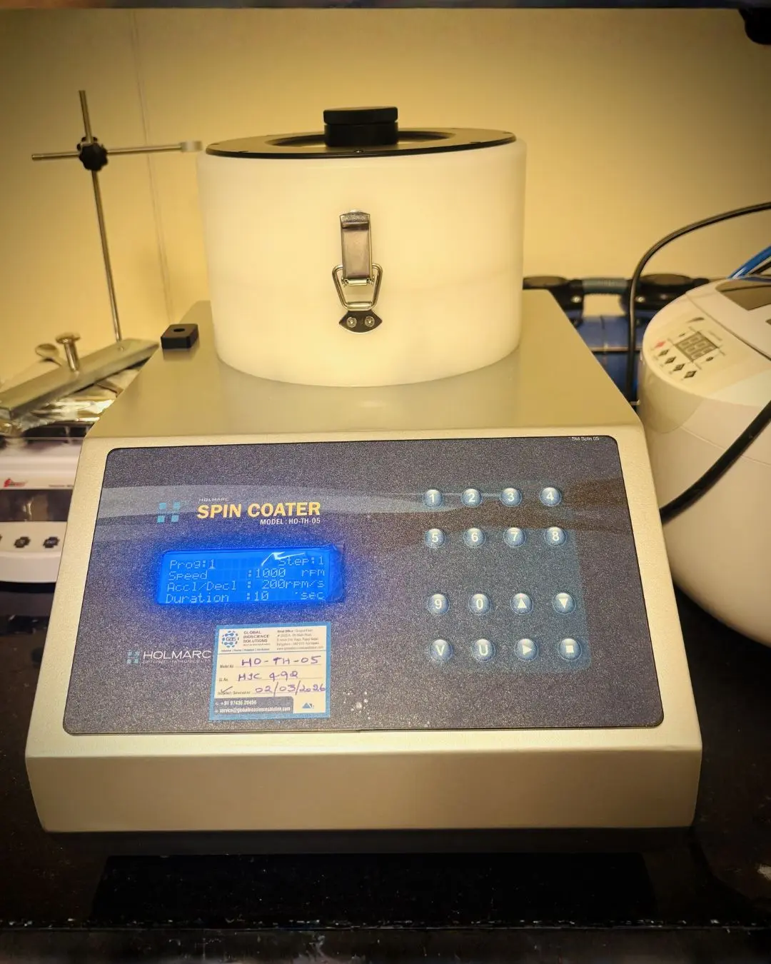 Thin film coating spin coater setup at IISc Bangalore materials science research GBS installation